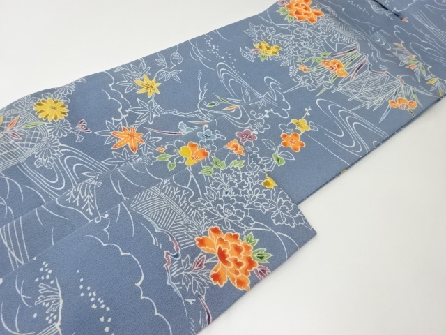  縮緬地柴垣に流水・草花模様名古屋帯